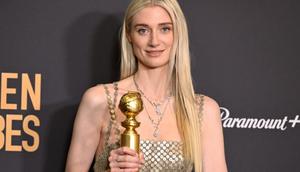 Elizabeth Debicki poses with her Golden Globe for The Crown on January 7, 2024.ROBYN BECK/AFP/Getty Images