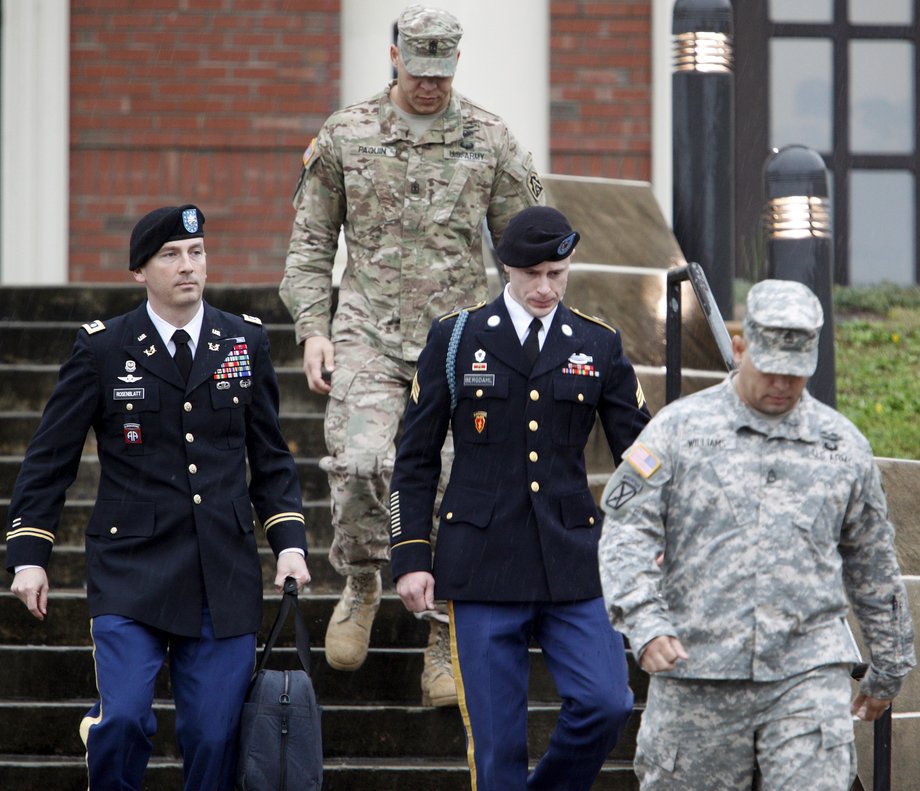 US Army Sgt. Bowe Bergdahl, second right, leaves the courthouse with his defense attorney Lt. Col. Franklin Rosenblatt, left, after a hearing for his court-martial in Fort Bragg, North Carolina, December 22, 2015.