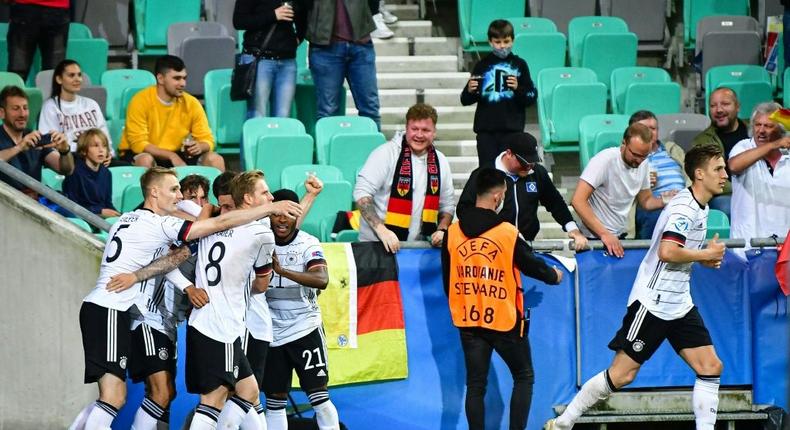 Germany players celebrate after Lukas Nmecha scored against Portugal in the Under-21 Euro final in Ljubljana Creator: Jure Makovec