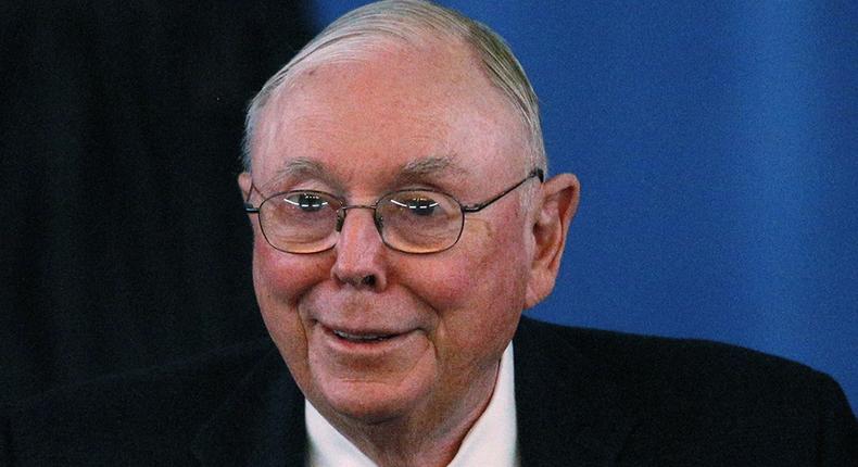 Berkshire Hathaway Vice Chairman Charlie Munger arrives to begin the company's annual meeting in Omaha May 4, 2013.