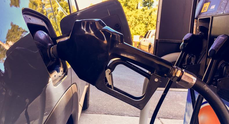 A car being fueled - pros and cons of diesel cars