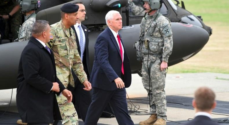 US Vice President Mike Pence (C) arrives at army base Camp Bonifas after a failed North Korean missile test, April 17, 2017