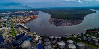 Riverside, Jetty with vessels drone view. [Stock Photo/Getty Images]