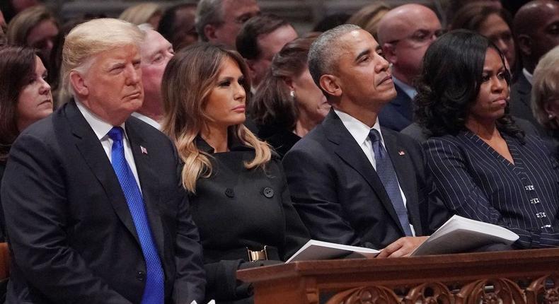 Former President Donald Trump, and First Lady Melania Trump, President Barack Obama and First Lady Michelle Obama attend the state funeral of former US president George H.W. Bush at the Washington National Cathedral in Washington, DC, December 5, 2018.