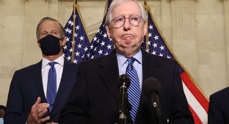 Senate Minority Leader Mitch McConnell (R-KY) talks to reporters with Sen. John Thune (R-SD) (L) and Sen. Roy Blunt (R-MO) following the weekly Senate Republican caucus luncheon in the Russell Senate Office Building on Capitol Hill March 16, 2021 in Washington, DC.
