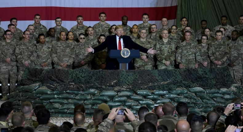 President Donald Trump speaks to US troops during a surprise Thanksgiving 2019 visit to Bagram air base in Afghanistan