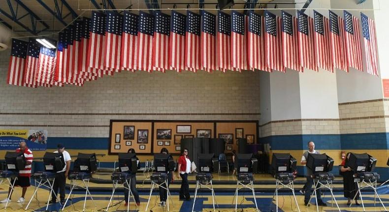 Voters cast their ballots on machines at Cheyenne High School on Election Day on November 8, 2016 in Las Vegas, Nevada