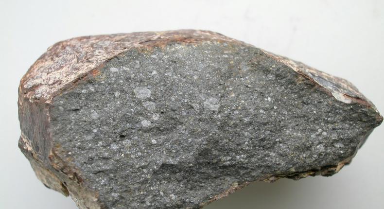 A piece of the meteorite Sahara 97096 (about 10 cm long), an enstatite chondrite