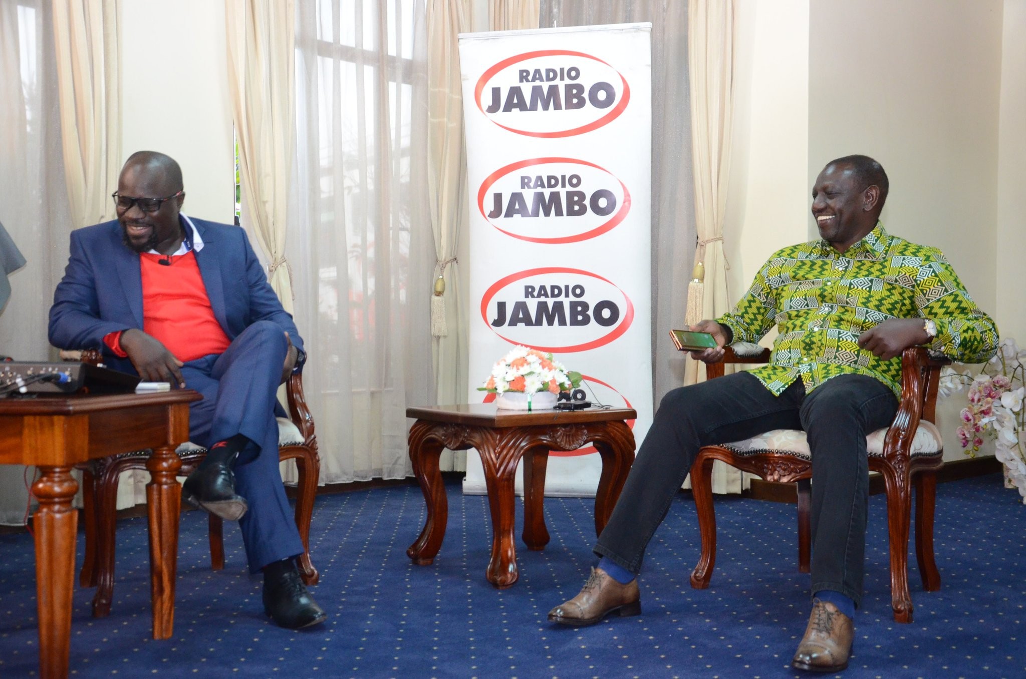 Deputy President William Ruto with Joseph Ogidi alias Gidi of Radio Jambo