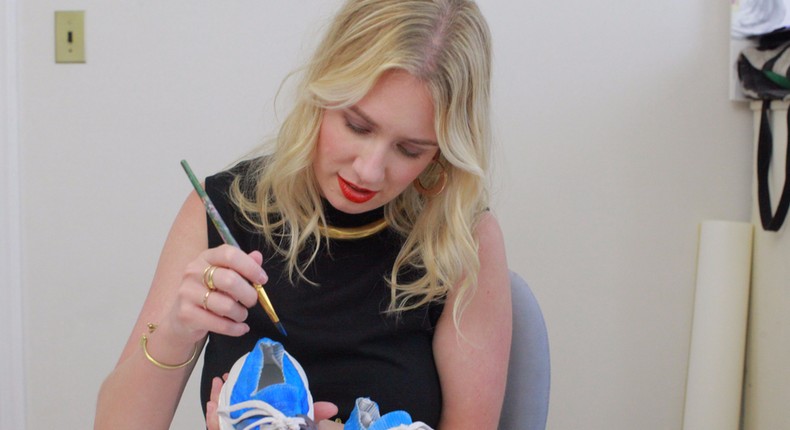 Fashion illustrator Meagan Morrison painting the California shoe.