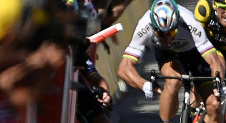 Slovakia's Peter Sagan (right) and Britain's Mark Cavendish (left) clash near the finishing line of the fourth stage of the Tour de France on July 4, 2017