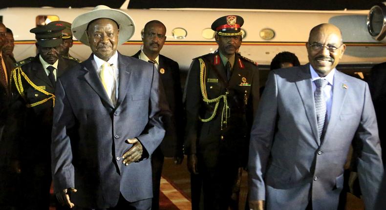 Sudan's President Omar al-Bashir welcomes Uganda's President Yoweri Museveni at Khartoum Airport for talks during an official visit to Sudan.