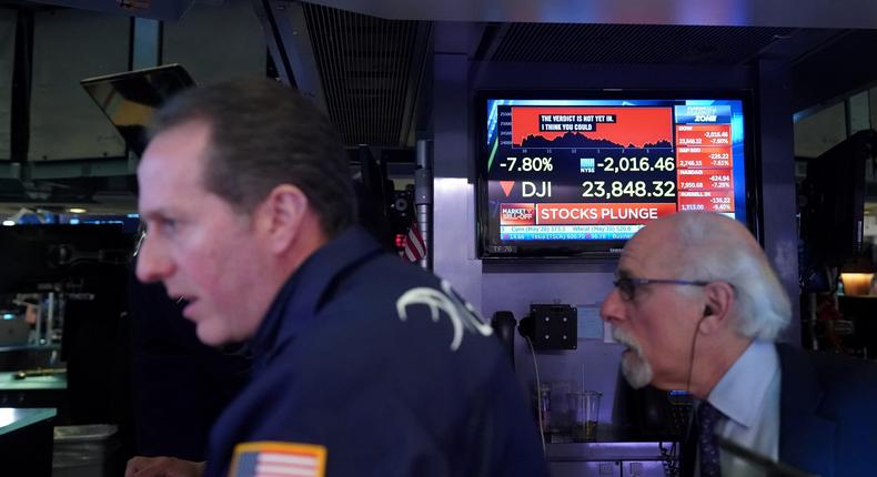 Traders work on the floor of the New York Stock Exchange (NYSE) in New York, U.S., March 9, 2020.Bryan R Smith/Reuters