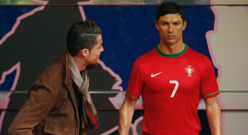 Cristiano Ronaldo gazes at the wax statue that was unveiled in 2013 at the Madrid Museum of Wax.