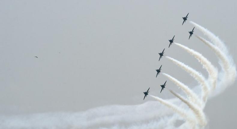 An aerobatics team performs a rehearsal before Pakistan's Independence Day celebrations