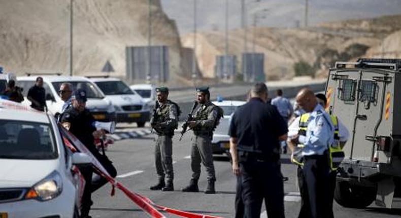 Israeli paramilitary police officers stand guard at the scene of what police said was an attempted ramming attack near the West Bank Jewish settlement of Kfar Adumim November 22, 2015.