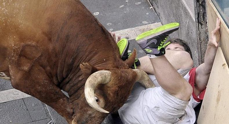 Three men gored as Spain's San Fermin bull-running week begins