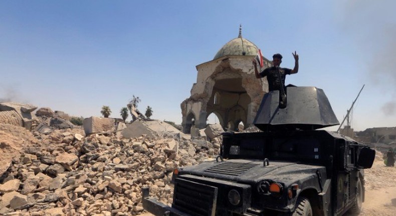 An armoured fighting vehicle of the Counter Terrorism Service is seen at the Grand al-Nuri Mosque at the Old City in Mosul