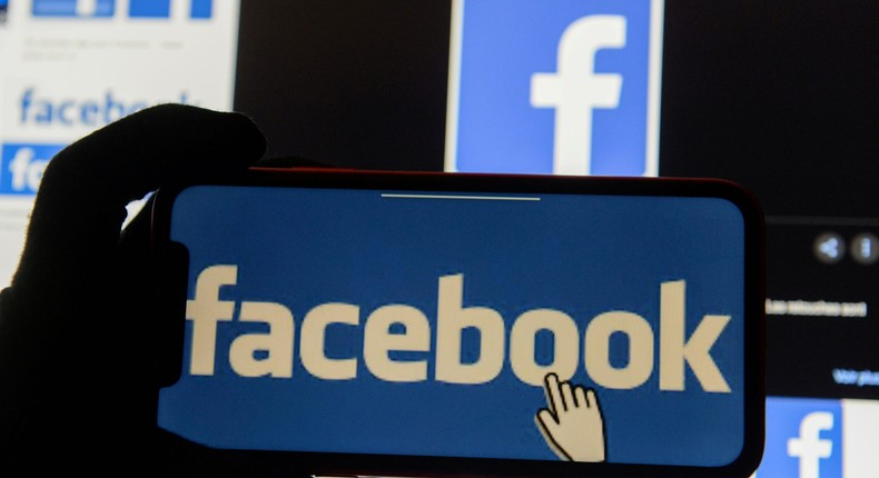 FILE PHOTO: The Facebook logo is displayed on a mobile phone in this picture illustration taken December 2, 2019. REUTERS/Johanna Geron/Illustration/File Photo