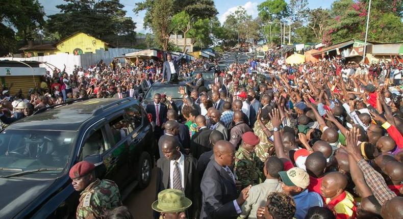 President Uhuru Kenyatta waves to supporters after he commissioned new medical equipment at Murang’a County Referral Hospital.