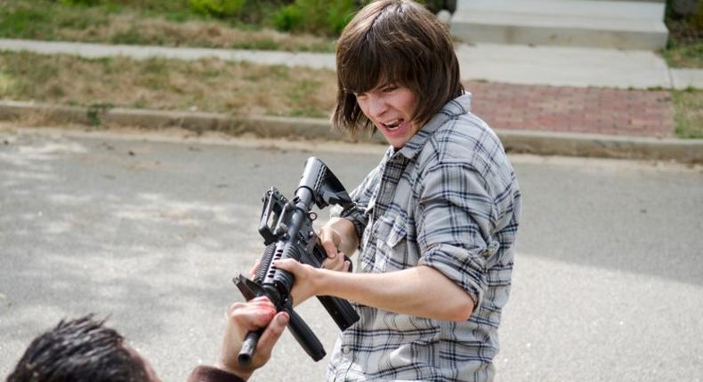 ___4378010___https:______static.pulse.com.gh___webservice___escenic___binary___4378010___2015___11___20___11___Carl-Shoots-a-Wolf-in-The-Walking-Dead-Season-6-Episode-2-750x522-1446839007