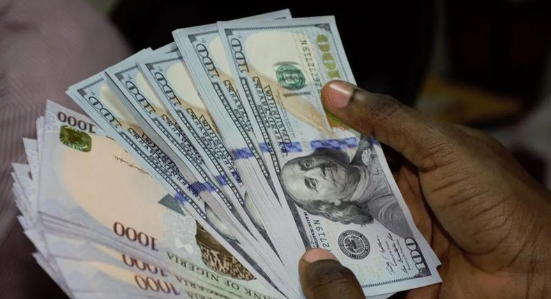 Naira strengthens against Dollar as exchange rate improves to ₦1,405/USD (Nairamtetrics)