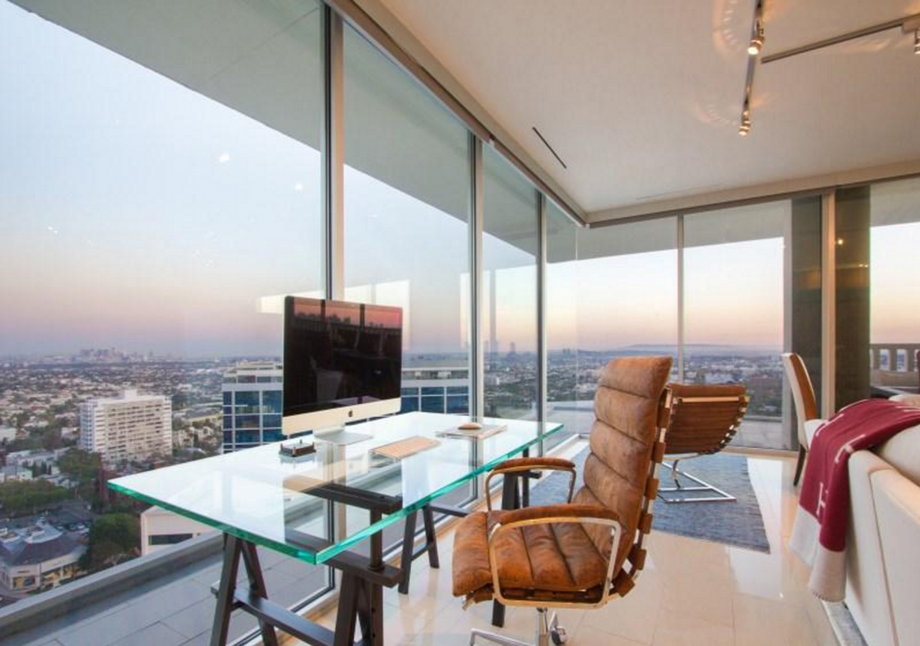 Floor-to-ceiling glass makes for a prime office perch.
