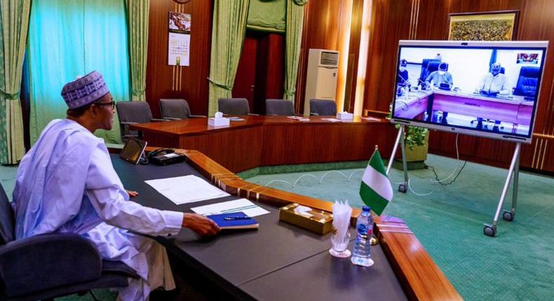 President Muhammadu Buhari receiving updates from the Presidential Task Force on Coronavirus via teleconferencing. [Twitter/@BashirAhmaad]