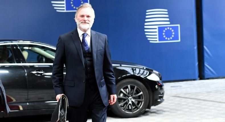 Britain's ambassador to the EU Tim Barrow arrives to deliver Brexit letter to EU president Donald Tusk