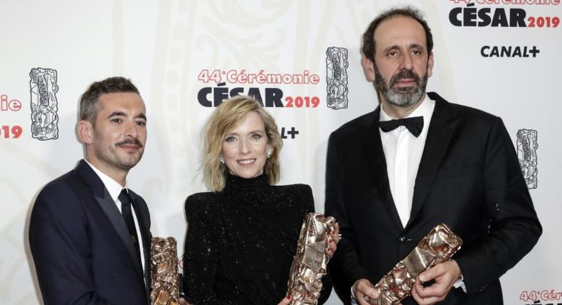French director Xavier Legrand (L) winner of the Best film award and Best Original Screenplay award with actress Lea Drucker, winner of Best actress award and producer Alexandre Gavras