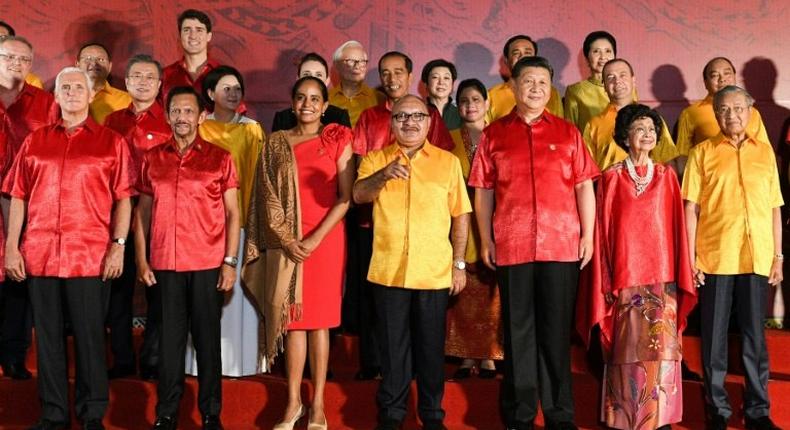 In an APEC tradition, leaders donned local costume for the gala dinner