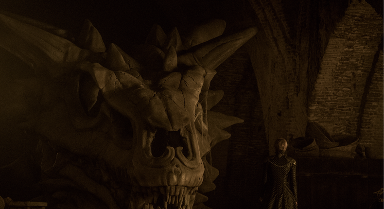 Cersei Lannister and the skull of the dragon Balerion.