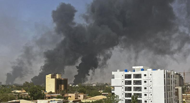 Smoke billows above residential buildings in Khartoum on as fighting in Sudan raged for a second day on April 16.Source: AFP/Getty Images.