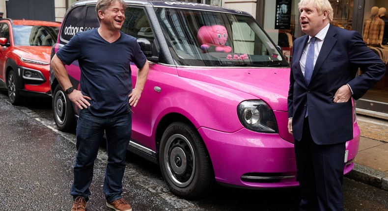 Octopus Energy CEO Greg Jackson alongside former UK leader Boris Johnson.Leon Neal - WPA Pool /Getty Images