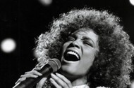 Singer Whitney Houston performing in 1986