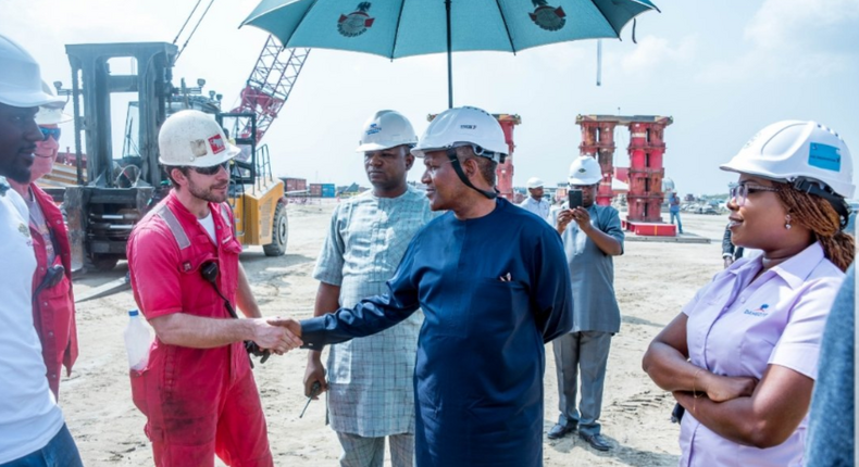 Aliko Dangote and other officials at Dangote Refinery site