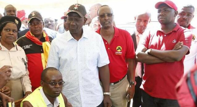 Deputy President William Ruto, Isiolo Senator Mohamed Kuti and Elgeyo Marakwet Senator Kipchumba Murkomen during a voter registration exercise.