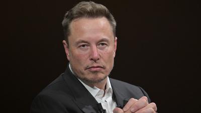 Elon Musk said forcing users to sign in to view tweets was a temporary measure.Alain Jocard/Getty Images