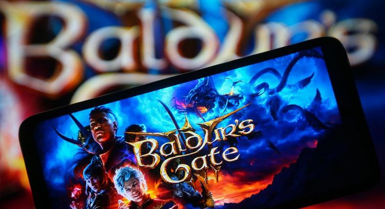 Baldur's Gate 3 on a smartphone screen.Getty Images