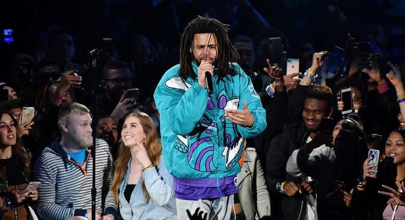 J Cole performing at the NBA All Star game [Complex]