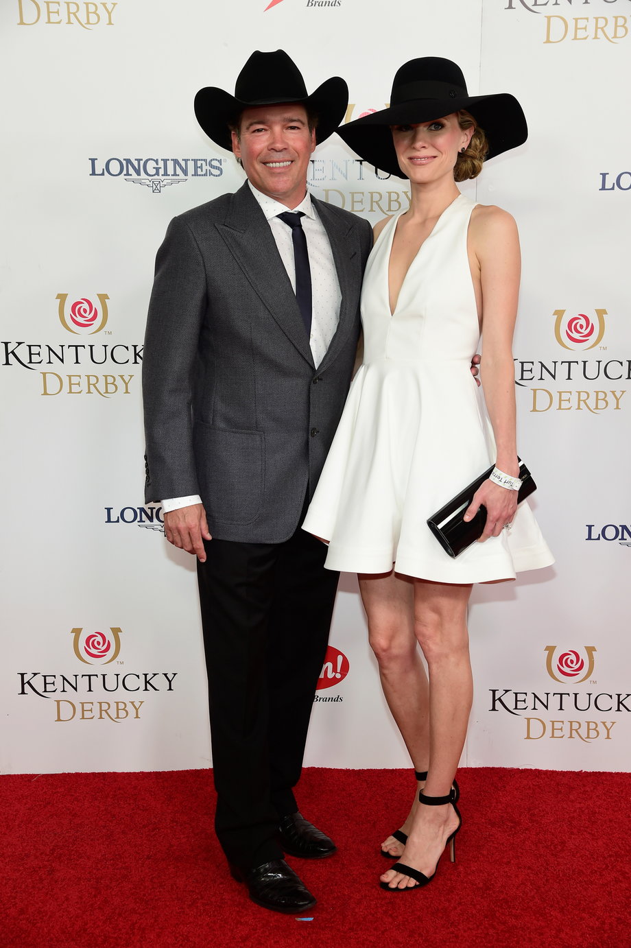 BEST: County music star Clay Walker and wife and model Jessica Craig donned simple hats and stylish outfits.