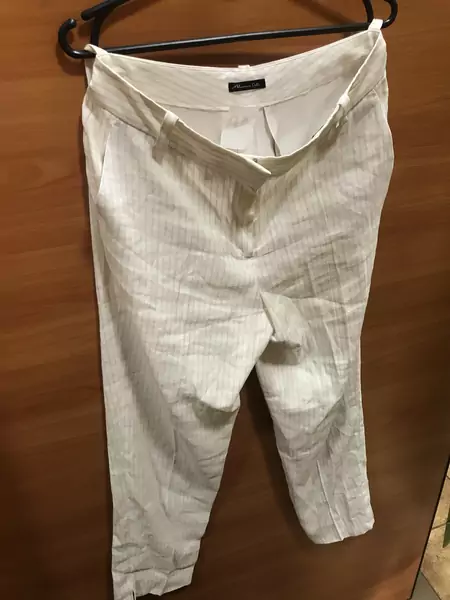 Lniane spodnie garniturowe z Massimo Dutti. Cena: 40 zł