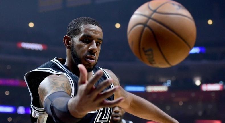 LaMarcus Aldridge scored 23 points to power San Antonio over visiting Memphis 97-90, at AT&T Center in San Antonio, Texas, on March 23, 2017