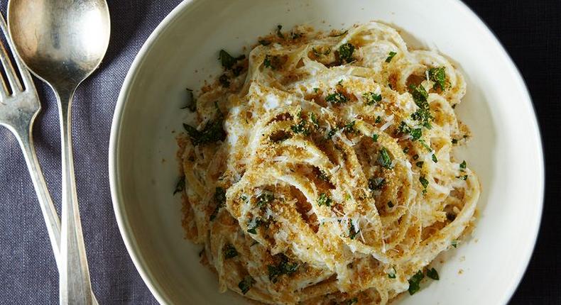 white pasta with garlic, cheese, bread crumbs