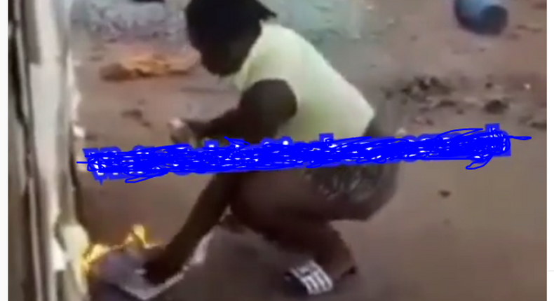 End time Ghanaian slay queen pours kerosene on 'Bible' sets it ablaze to test Gods power (video)