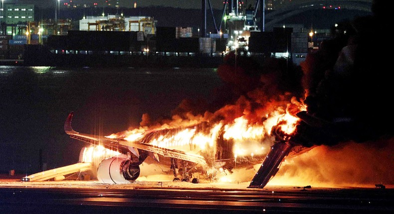 STR/JIJI PRESS/AFP via Getty Images