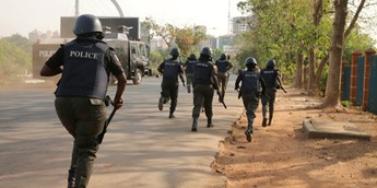 Nigerian Police officers on the run (Illustraton - NewDawnNigeria)