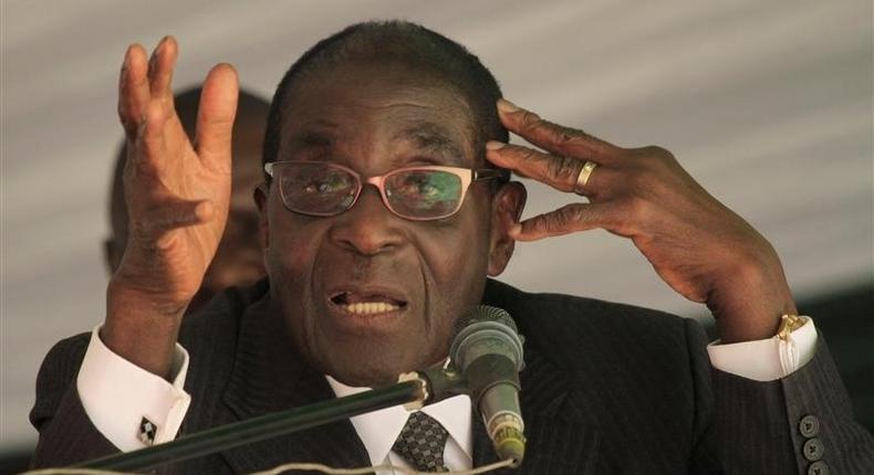 Zimbabwe President Robert Mugabe addresses a memorial service for retired general Solomon Mujuru at Ruzambo Farm in the Beatrice area, about 65 km (40 miles) south of the capital Harare, May 5, 2012. REUTERS/Philimon Bulawayo