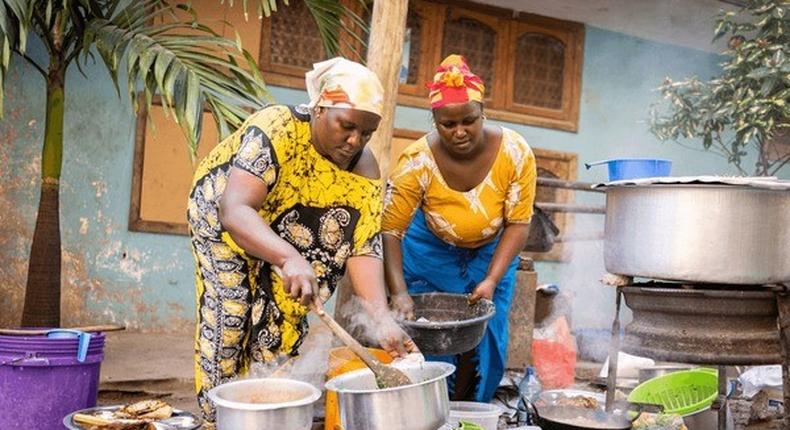 Black women cooking in the Kitchen