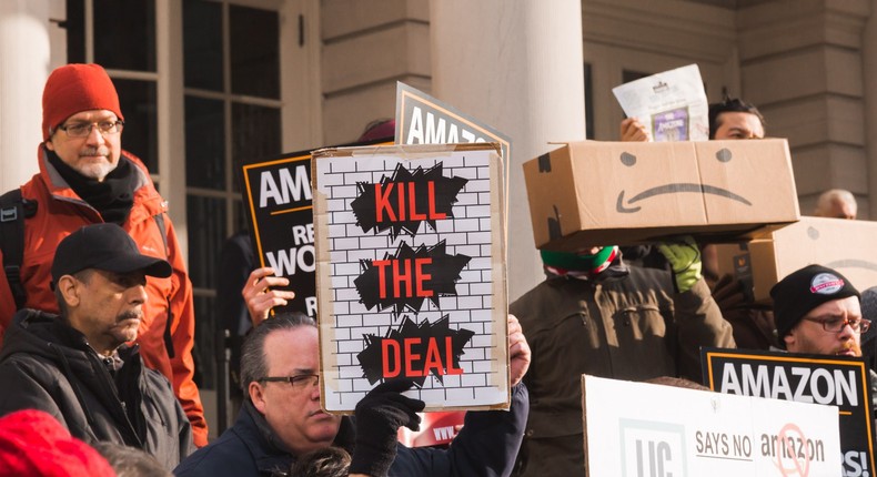 Protesters were at the hearing, making their opinions on the deal known.